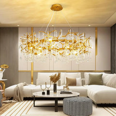 Close-up of the gold branch chandelier, highlighting the intricate design and the arrangement of crystals.