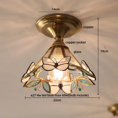 Ceiling light fixture with butterfly design and measurements on a neutral background