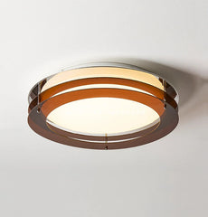 Modern ceiling light fixture with wooden finish on a white background