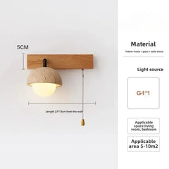 Wall-mounted light fixture with dimensions and material details on a white background