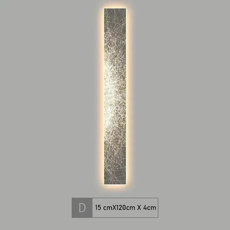 Tall vertical light fixture with decorative glass on a gray background