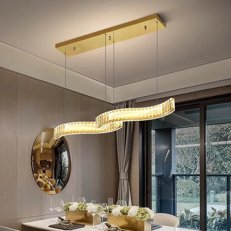 Modern ceiling light fixture in a stylish interior setting with a mirror and decor.