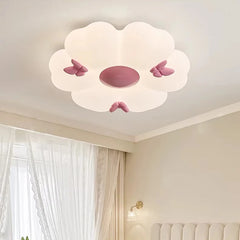 White flower cloud semi-flush mount ceiling light with pink butterflies, mounted on a white ceiling.