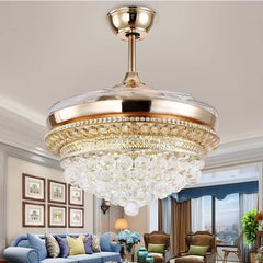 Gold ceiling fan with crystal lights in a living room setting