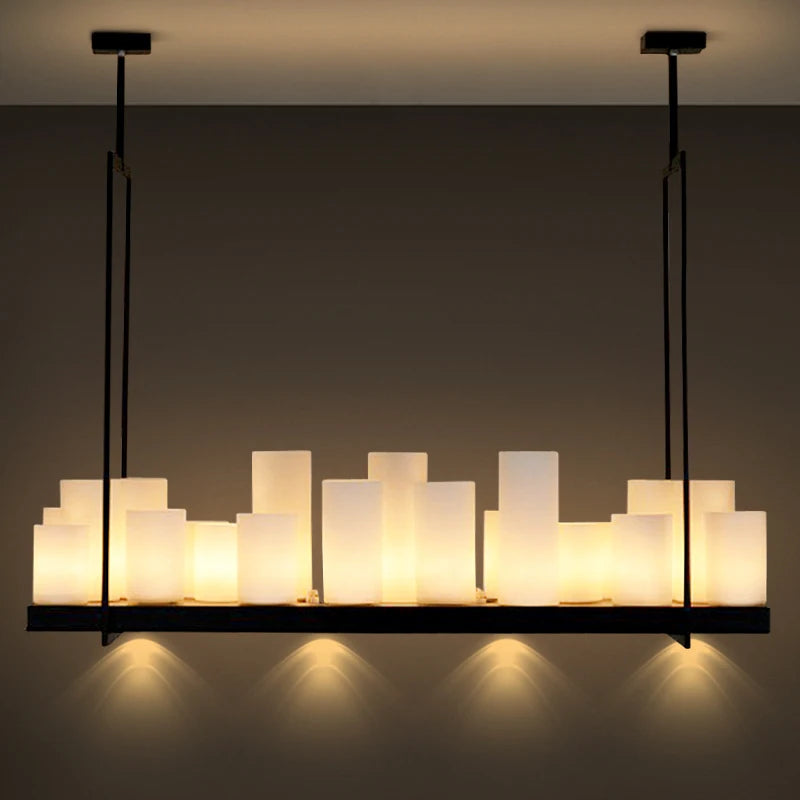 Modern chandelier with glass shades on a dark background