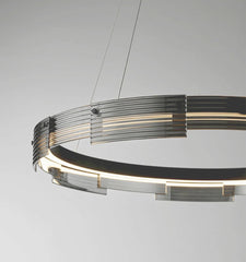 Modern chandelier with circular design on a gray background