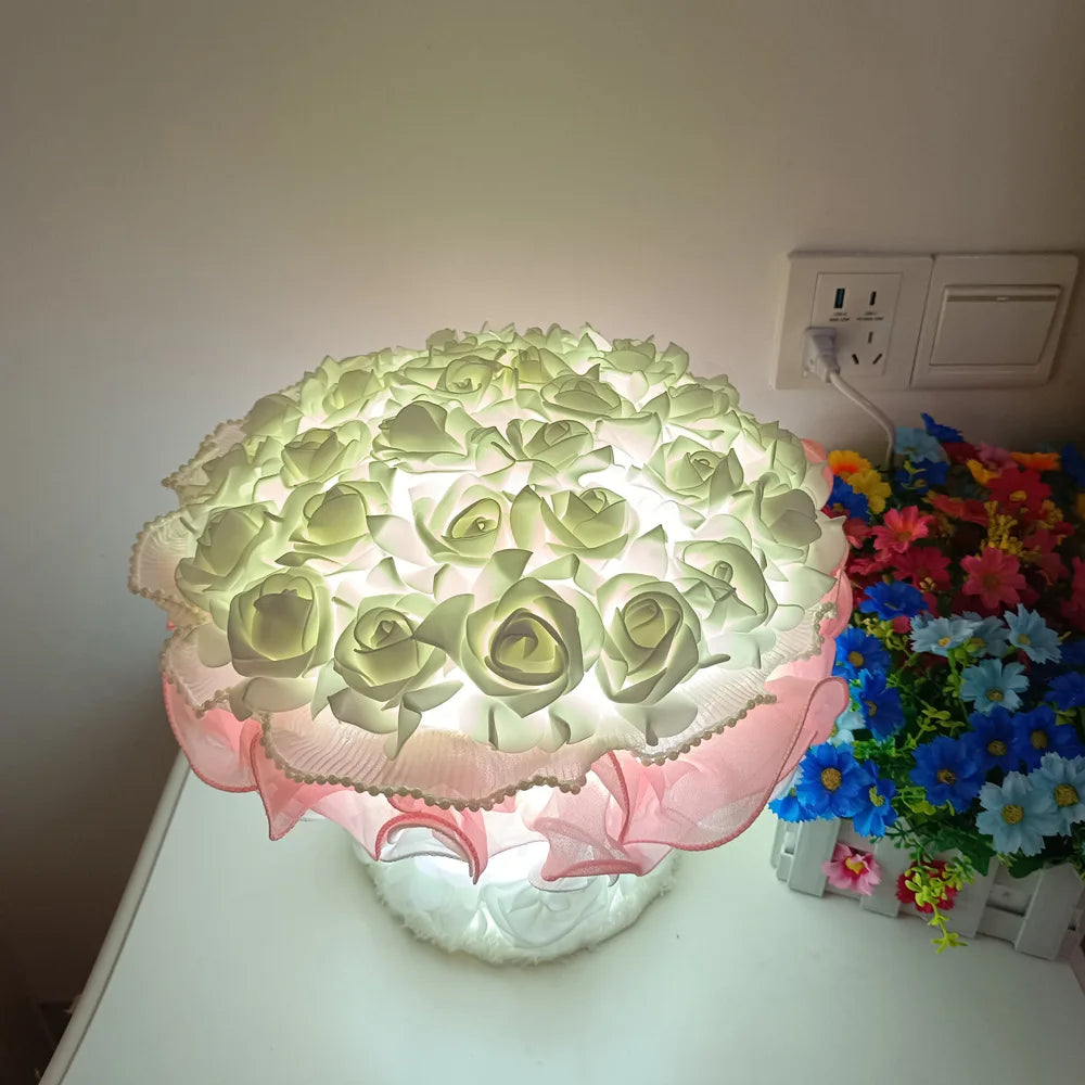Decorative lamp with floral design on a white surface