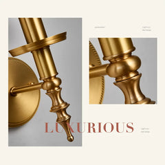 Gold wall sconce with 'LUXURIOUS' text on a gray background