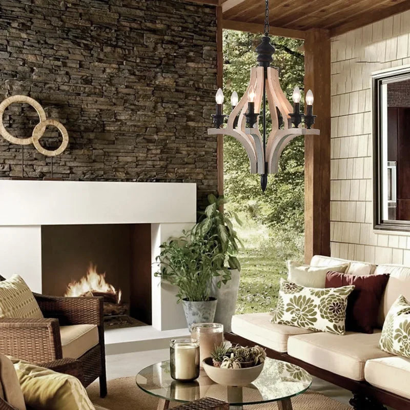 Cozy living room with fireplace, chandelier, and outdoor view