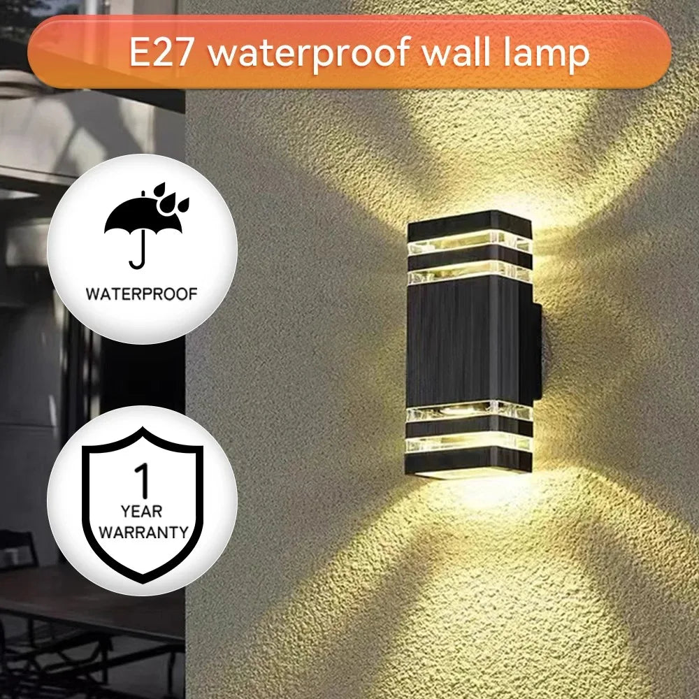 E27 waterproof wall lamp on a textured wall with waterproof and warranty icons.