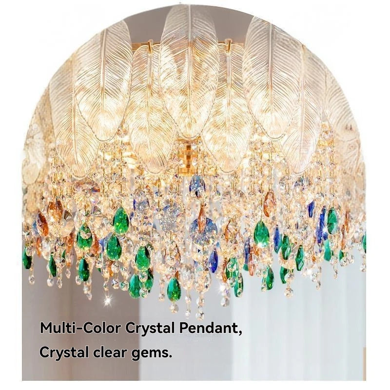 Multi-color crystal pendant light fixture with clear gems on a white background