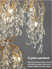 Crystal pendant light fixture with gold accents on a gray background