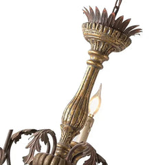 Decorative chandelier with intricate design on a white background