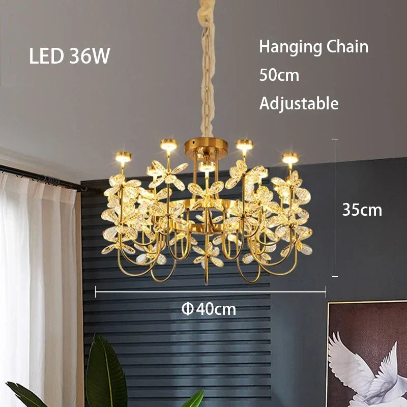 Gold chandelier with measurements and specifications on a neutral background