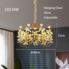 Gold chandelier with measurements and specifications on a neutral background