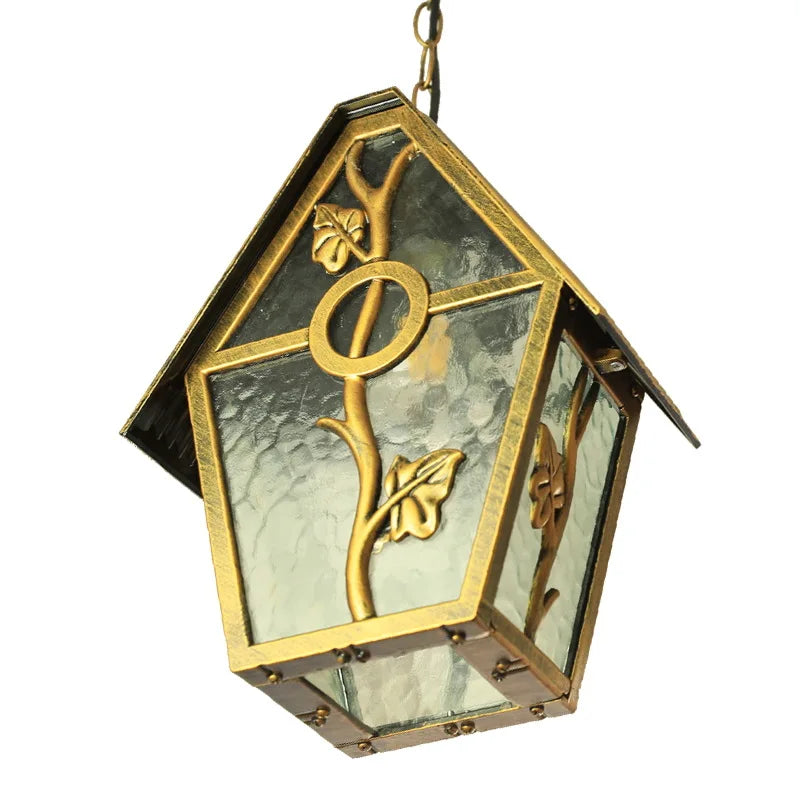 Decorative hanging lantern with gold leaf design on a white background