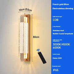 Wall-mounted light fixture with remote control, dimensions, and technical specifications displayed.