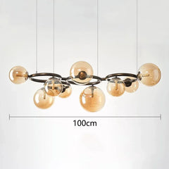 Chandelier with gold bulbs and black metal frame on a white background, labeled '100cm'.