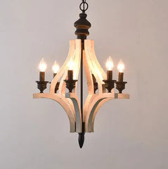 Chandelier with wooden design and glass shades on a plain background
