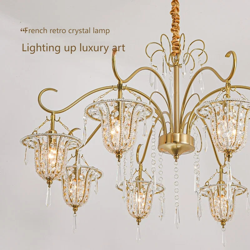 Detail of the gold finish and crystal accents on the chandelier, with text overlay mentioning 'French retro crystal lamp'.