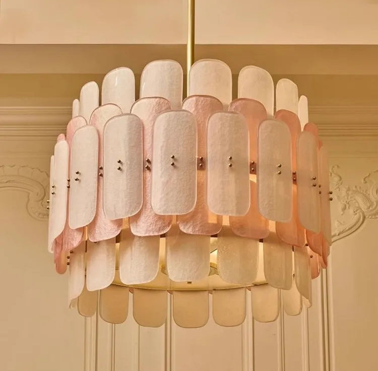 Pink chandelier with a beige wall background