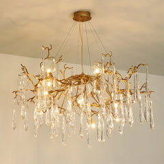 Gold chandelier with crystal elements on a ceiling