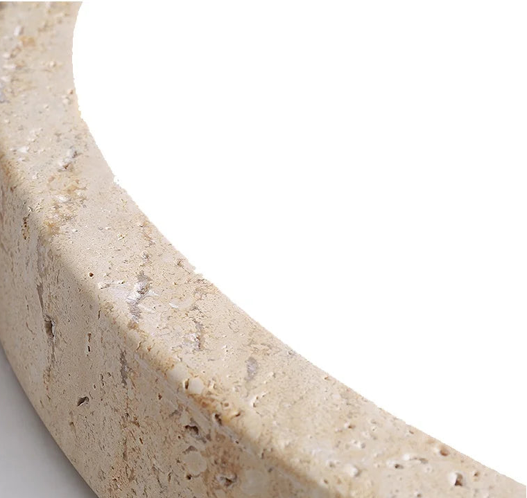 Beige stone sculpture on a white background