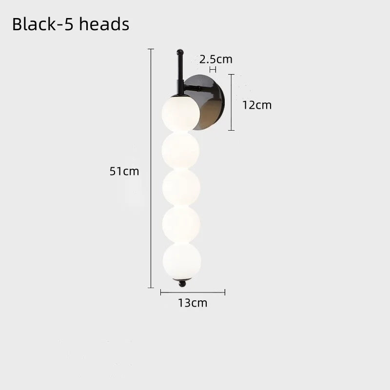 Wall light fixture with dimensions labeled on a white background