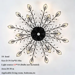 Decorative ceiling light fixture with leaf-like design on a white background