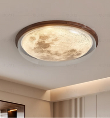 Ceiling light fixture with moon design on a ceiling