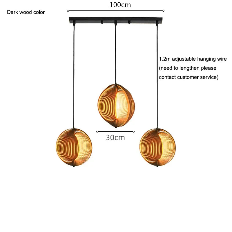 Three spherical pendant lights with dimensions and hanging wire details on a white background