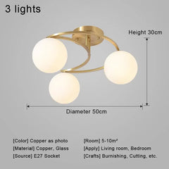 Ceiling light fixture with three spherical lights, gold frame, and measurements on a gray background.