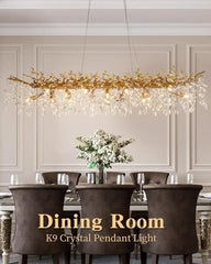 Dining room with a gold crystal pendant light fixture.