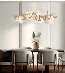 Gold Wave Chandelier with Clear Glass Disc Shades and Brass Accents