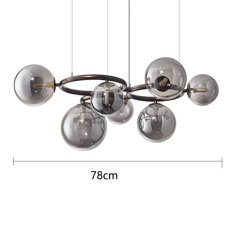 Chandelier with smoked glass spheres and measurement label on a white background