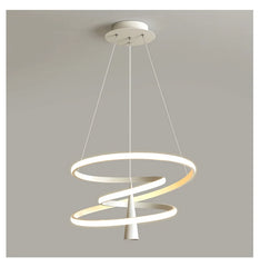Modern pendant light with spiral design on a gray background
