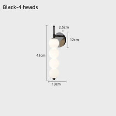 Wall-mounted light fixture with dimensions labeled on a white background