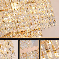 Close-up of a gold and crystal chandelier with detailed views.