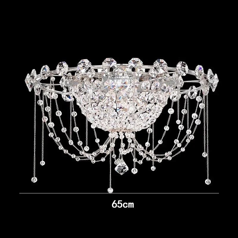 Decorative crystal light fixture with measurements on a black background
