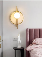 Modern wall lamp with round design in a bedroom setting