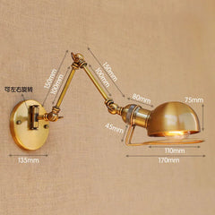 Close-up diagram of a brass swing arm wall sconce, detailing adjustable joints and shade dimensions.