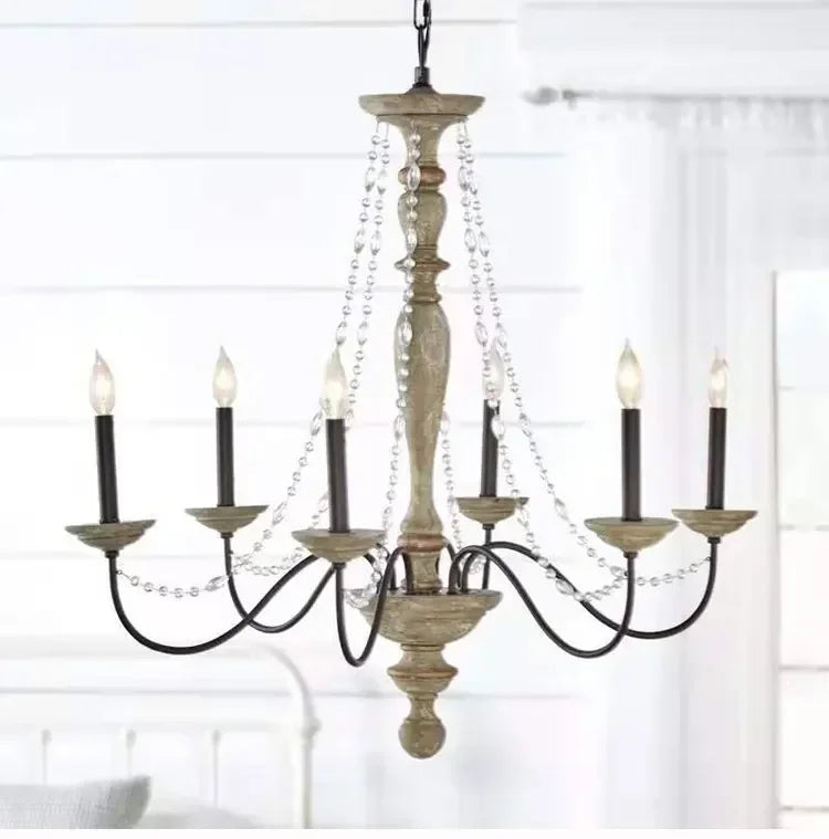 Wooden chandelier with candle-style lights on a white background