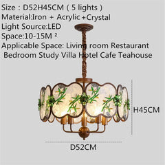 Bronze Chandelier with Frosted Glass and Green Leaf Floral Accents