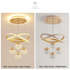 Gold chandelier with crystal balls on a beige and white background