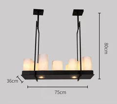 Modern pendant light with dimensions on a gray background