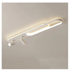 Modern ceiling light fixture on a plain wall