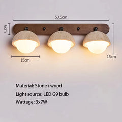 Three-light fixture with stone-like lampshades and wooden bracket, showing dimensions and material details.