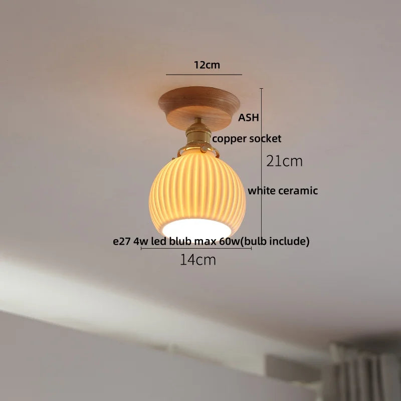 Ceiling light fixture with dimensions labeled on a white background