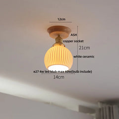 Ceiling light fixture with dimensions labeled on a white background
