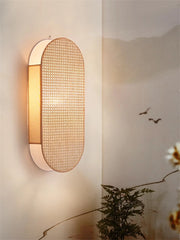 Modern wall light fixture on a neutral background with soft lighting